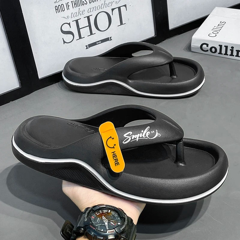 Coast™ – Mjuka herrtofflor med Smile-design