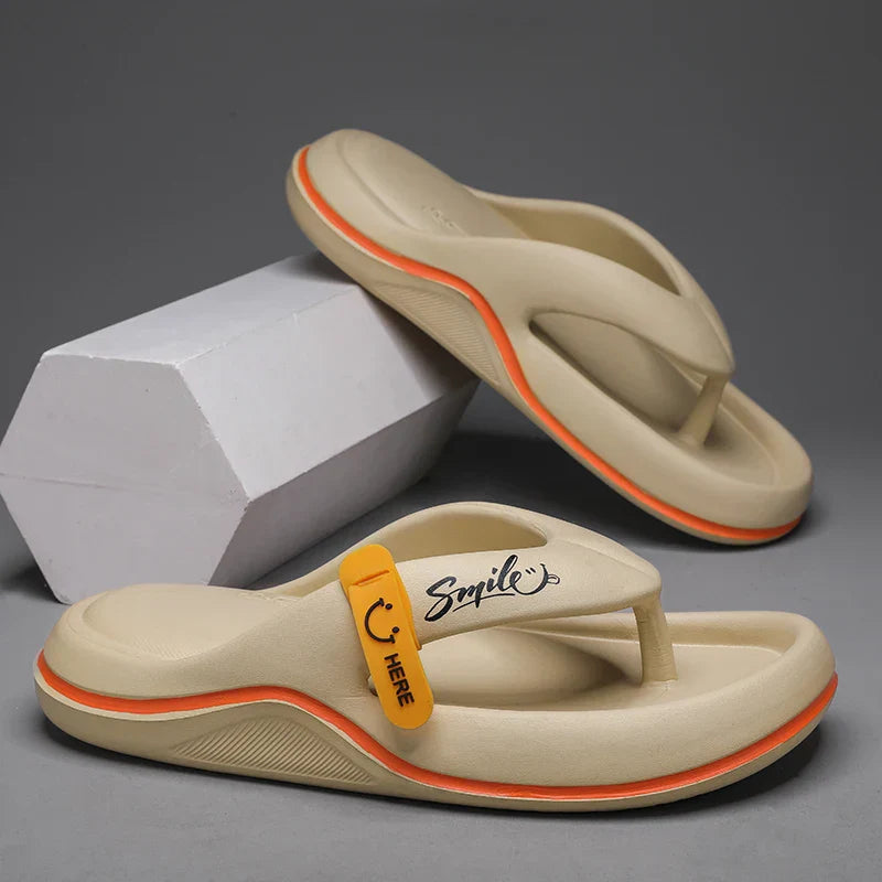 Coast™ – Mjuka herrtofflor med Smile-design
