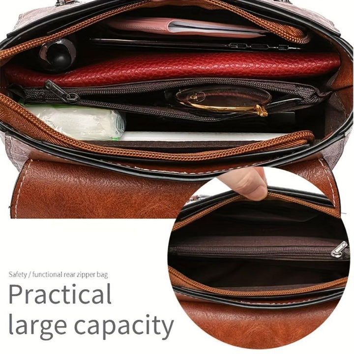 Britt-Louise™ – Retro-chic axelremsväska med låsdetalj